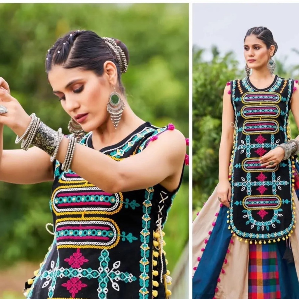 Black sleeveless Navratri tunic top with Aari Embroidery, pompom trim adjustable